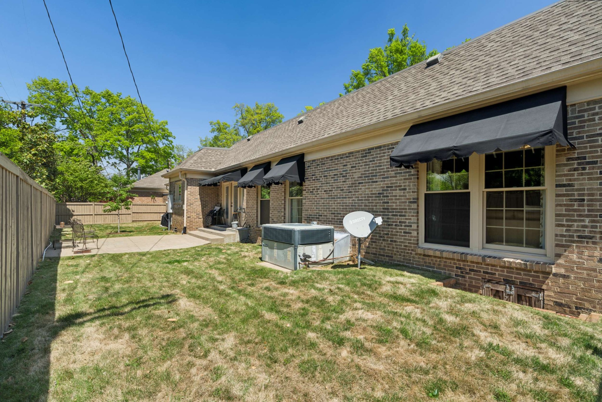 2723 Abbott Martin Road Nashville, TN 37215 - Photo 43 of 45 a backyard of a house with outdoor seating