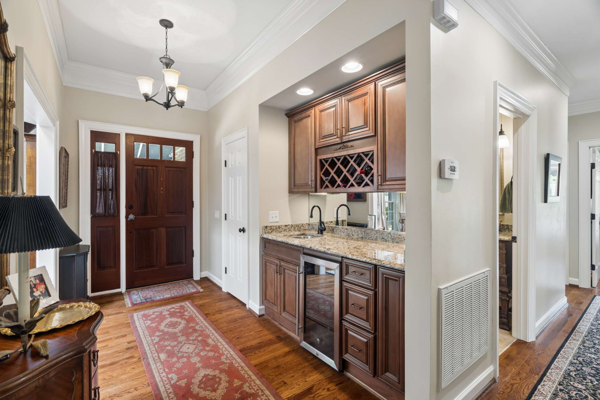2723 Abbott Martin Road Nashville, TN 37215 - Photo 5 of 45 a spacious bathroom with a granite countertop sink a mirror and a shower
