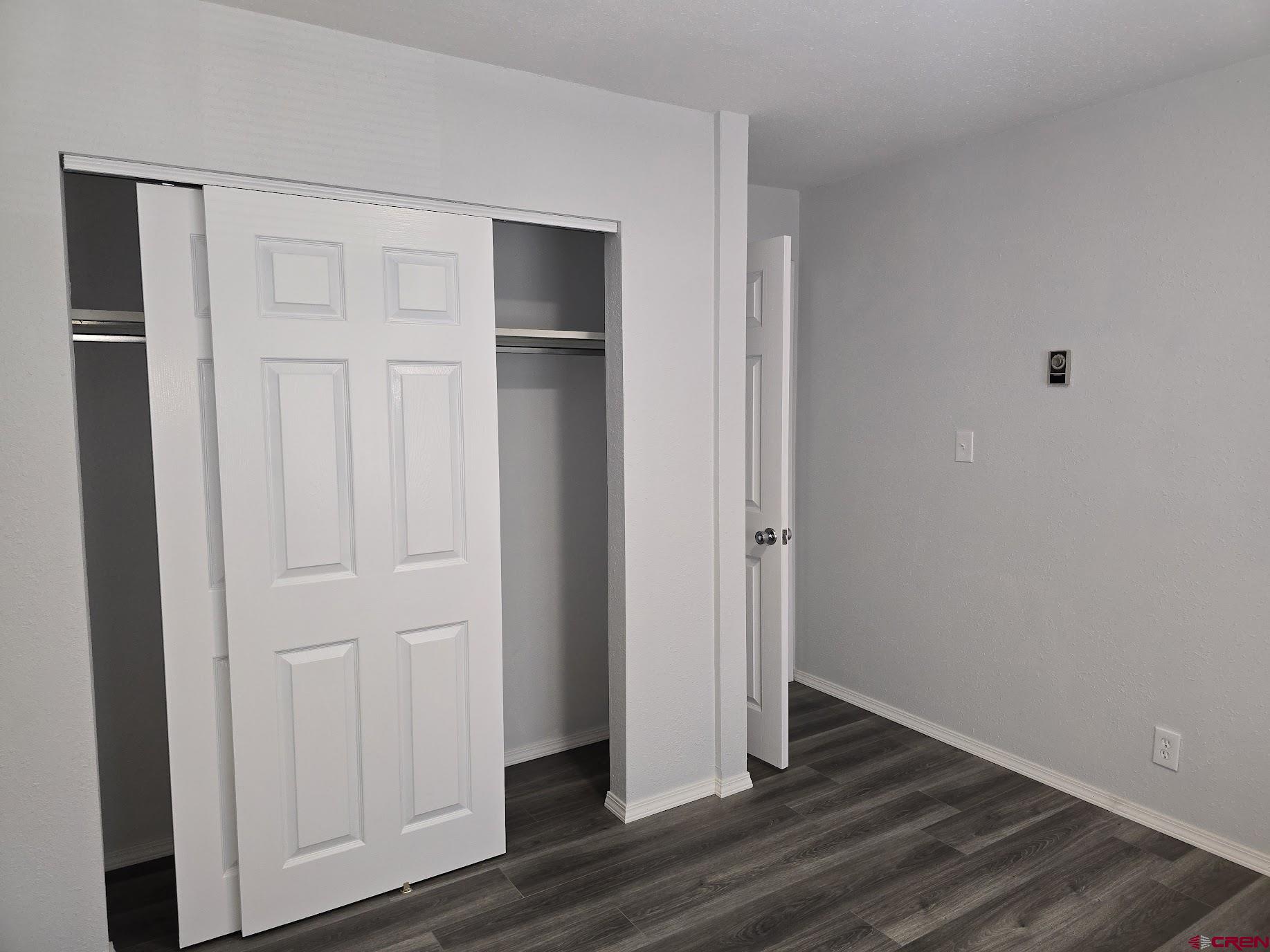 34237 Highway 550, Unit 9 Durango, CO 81301 - Photo 13 of 18 a view of empty room with wooden floor