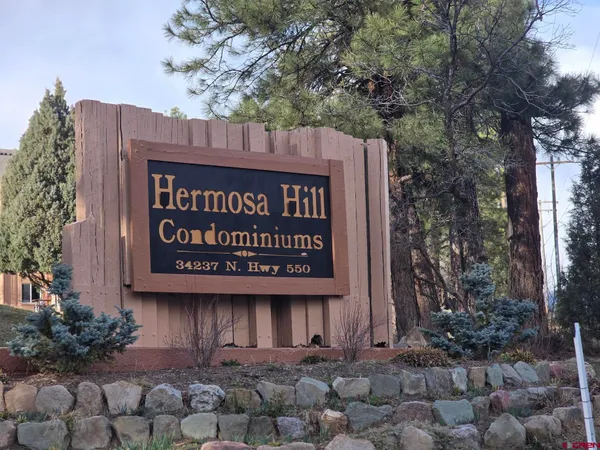 a view of a building with a street