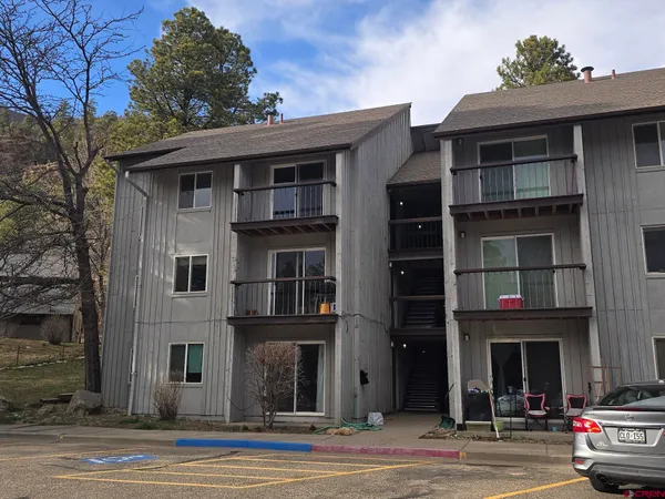 a car parked in front of a house
