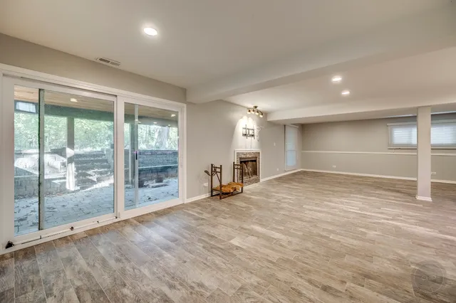 a view of empty room with a ceiling fan