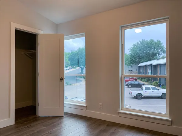a kitchen with a stove and a microwave