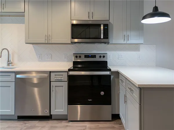 a view of cabinets and a wooden floor