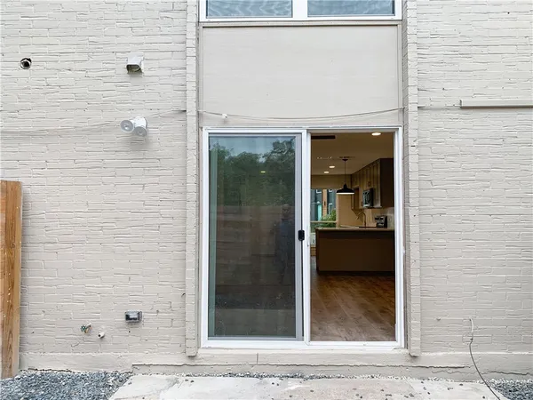 a bathroom with a sink a bathtub and a mirror