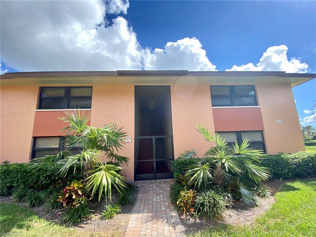 1516 Mainsail Drive, Unit 2 Naples, FL 34114 - Photo 13 of 45 a view of a potted plants in front of a house