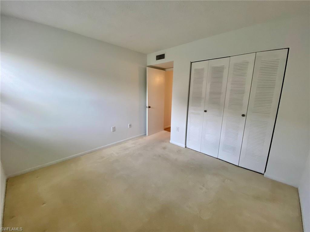 1516 Mainsail Drive, Unit 2 Naples, FL 34114 - Photo 28 of 45 a view of an empty room