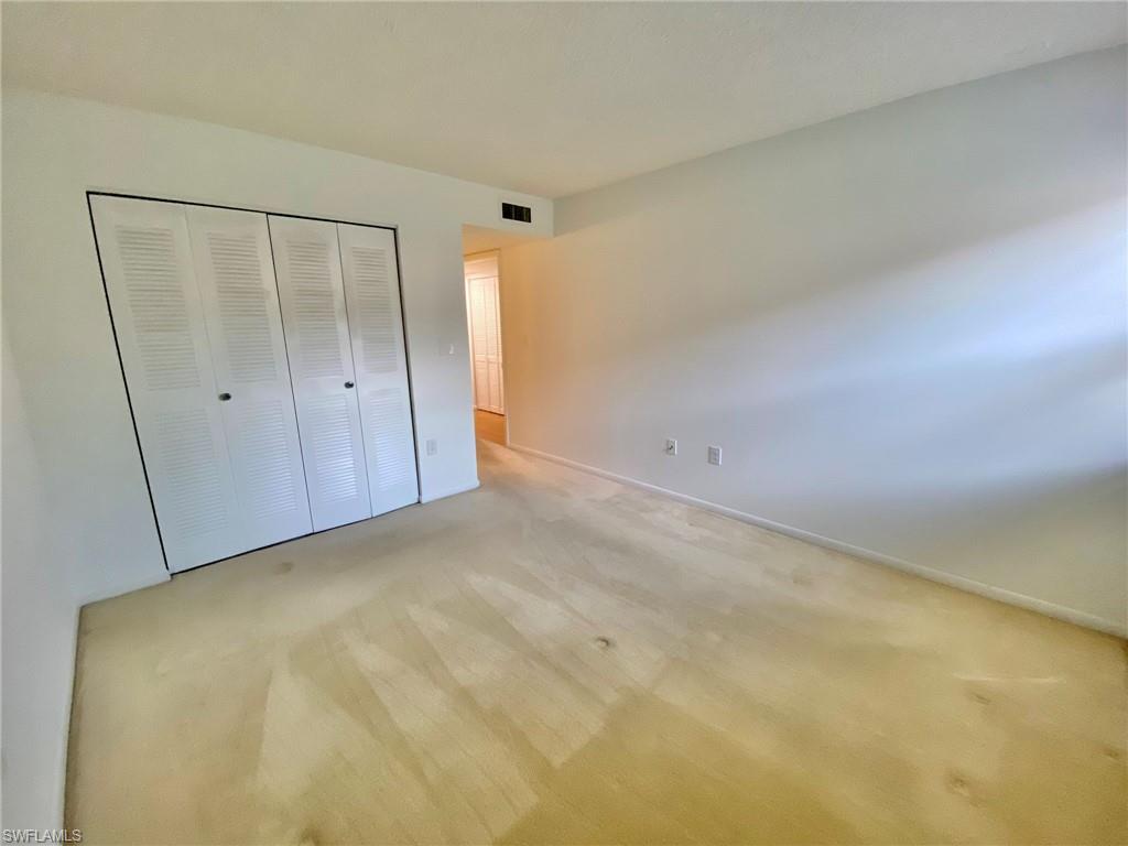 1516 Mainsail Drive, Unit 2 Naples, FL 34114 - Photo 7 of 45 a view of an empty room