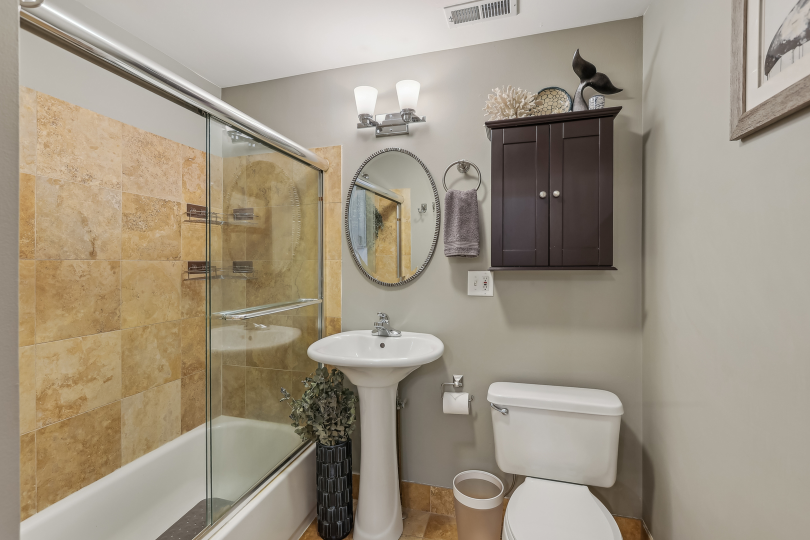 1025 West Madison Street, Unit 1 Chicago, IL 60607 - Photo 16 of 21 a bathroom with a toilet sink vanity tub and shower