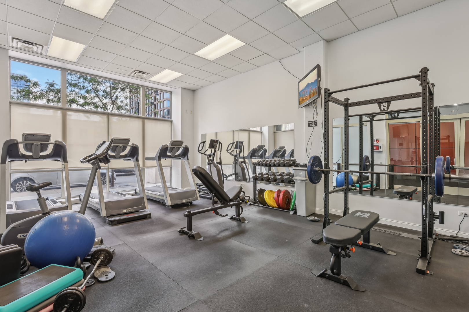 1025 West Madison Street, Unit 1 Chicago, IL 60607 - Photo 19 of 21 a view of a room with gym equipment