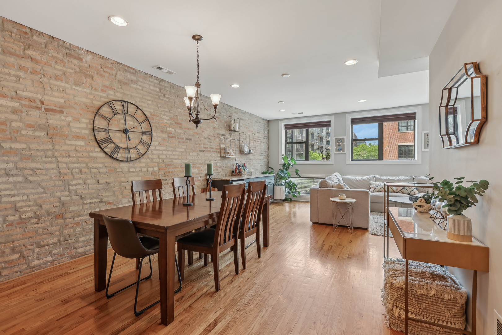 1025 West Madison Street, Unit 1 Chicago, IL 60607 - Photo 5 of 21 a view of a dining room with furniture window and wooden floor