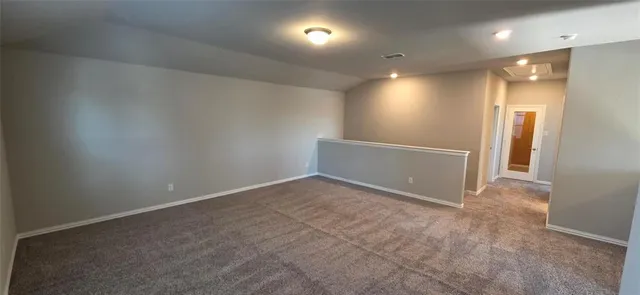 an empty room with an entryway