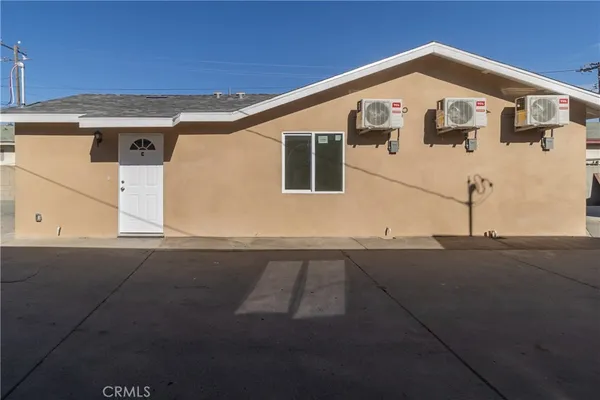 a front view of a house with garage