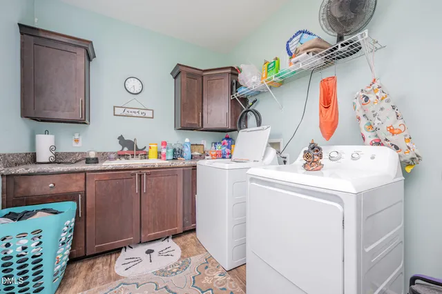 a room with sink and mirror