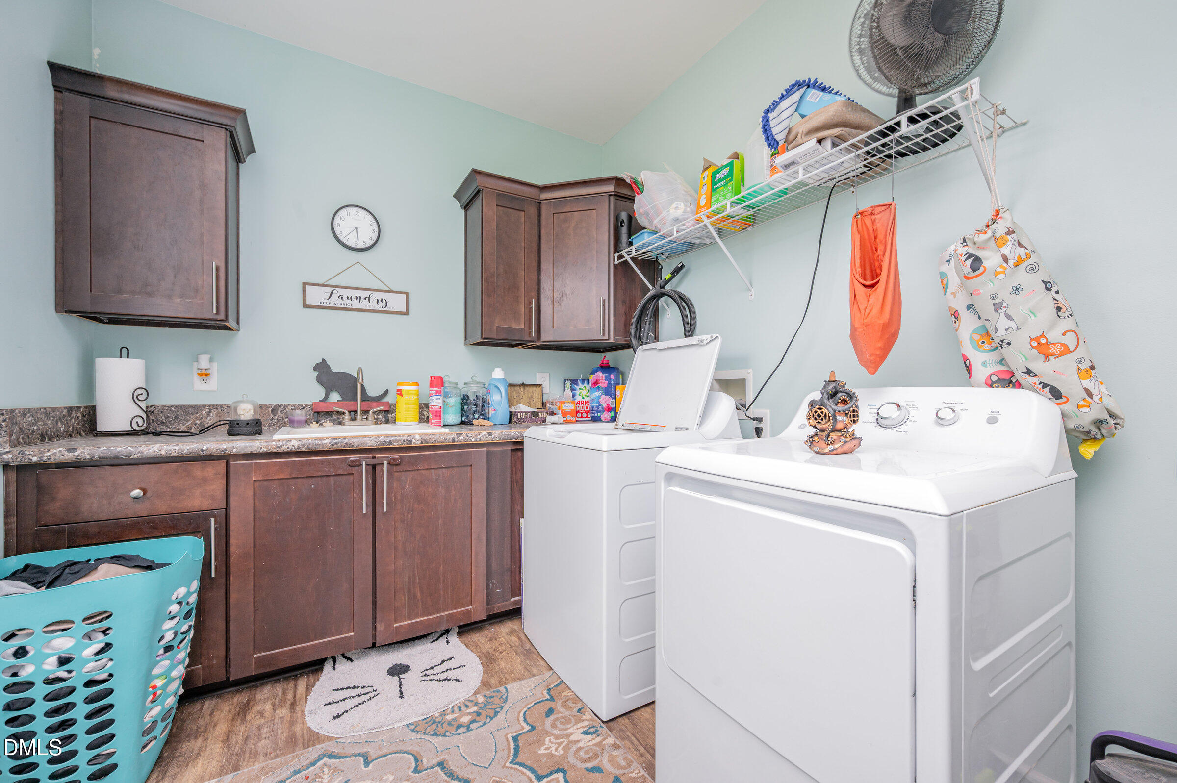 11801 Burlington Road Hurdle Mills, NC 27541 - Photo 13 of 32 a room with sink and mirror