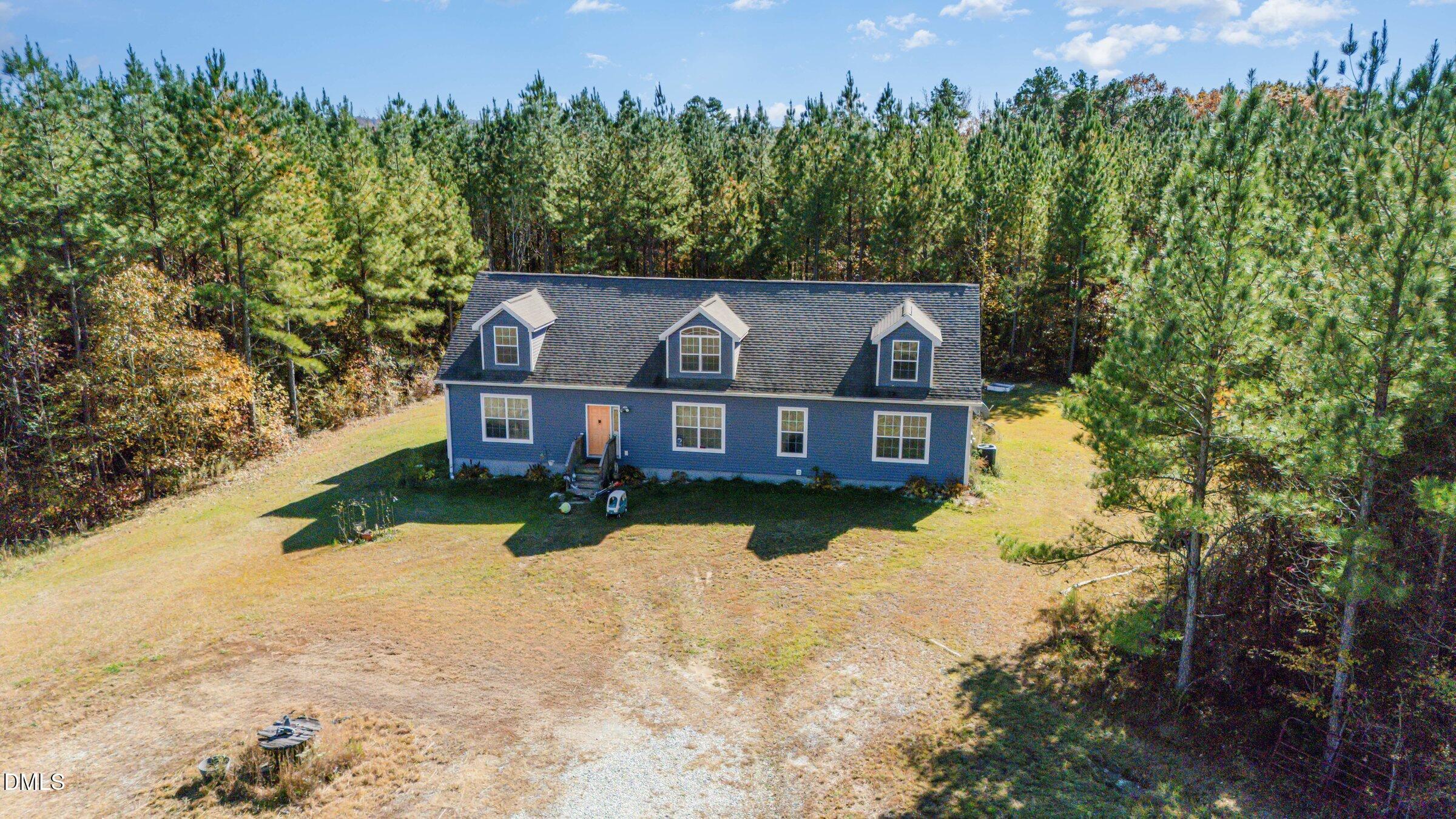 11801 Burlington Road Hurdle Mills, NC 27541 - Photo 29 of 32 a view of a house with a yard