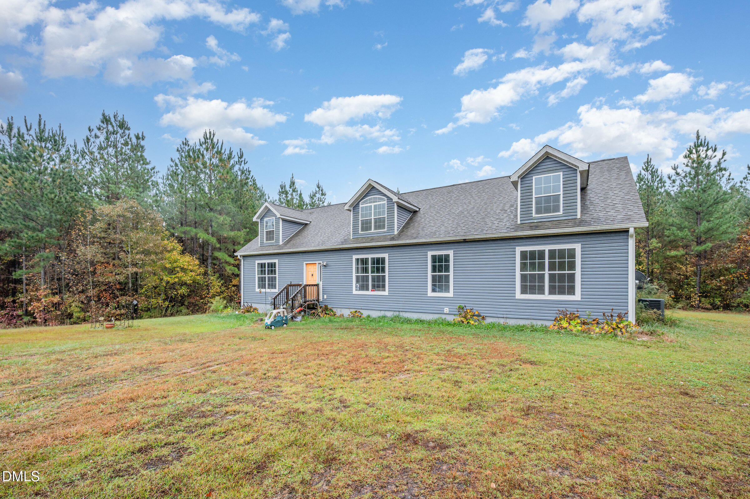 11801 Burlington Road Hurdle Mills, NC 27541 - Photo 2 of 32 a view of a yard in front of the house
