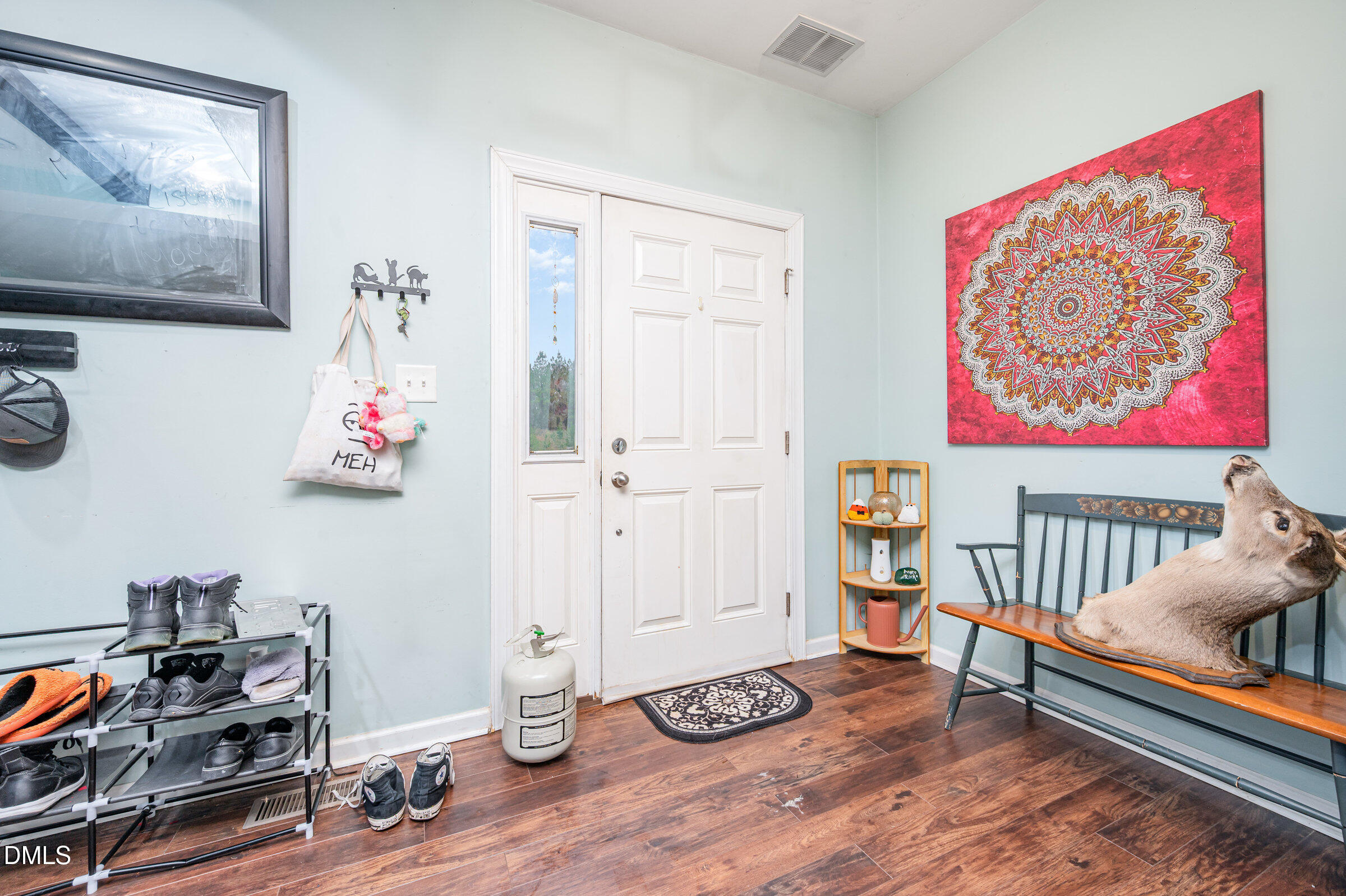 11801 Burlington Road Hurdle Mills, NC 27541 - Photo 5 of 32 a bedroom with furniture and wooden floor