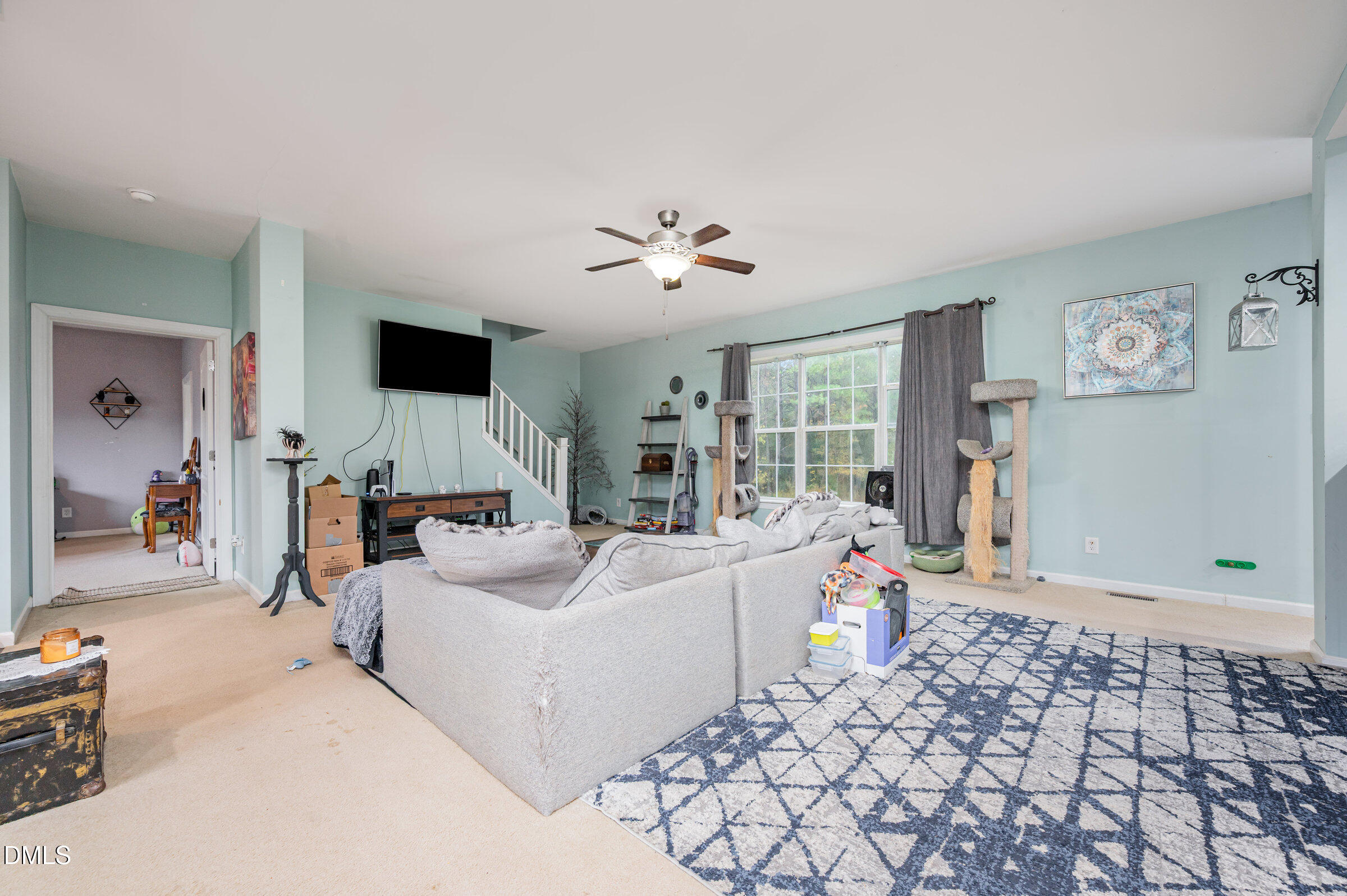 11801 Burlington Road Hurdle Mills, NC 27541 - Photo 6 of 32 a living room with furniture and a flat screen tv