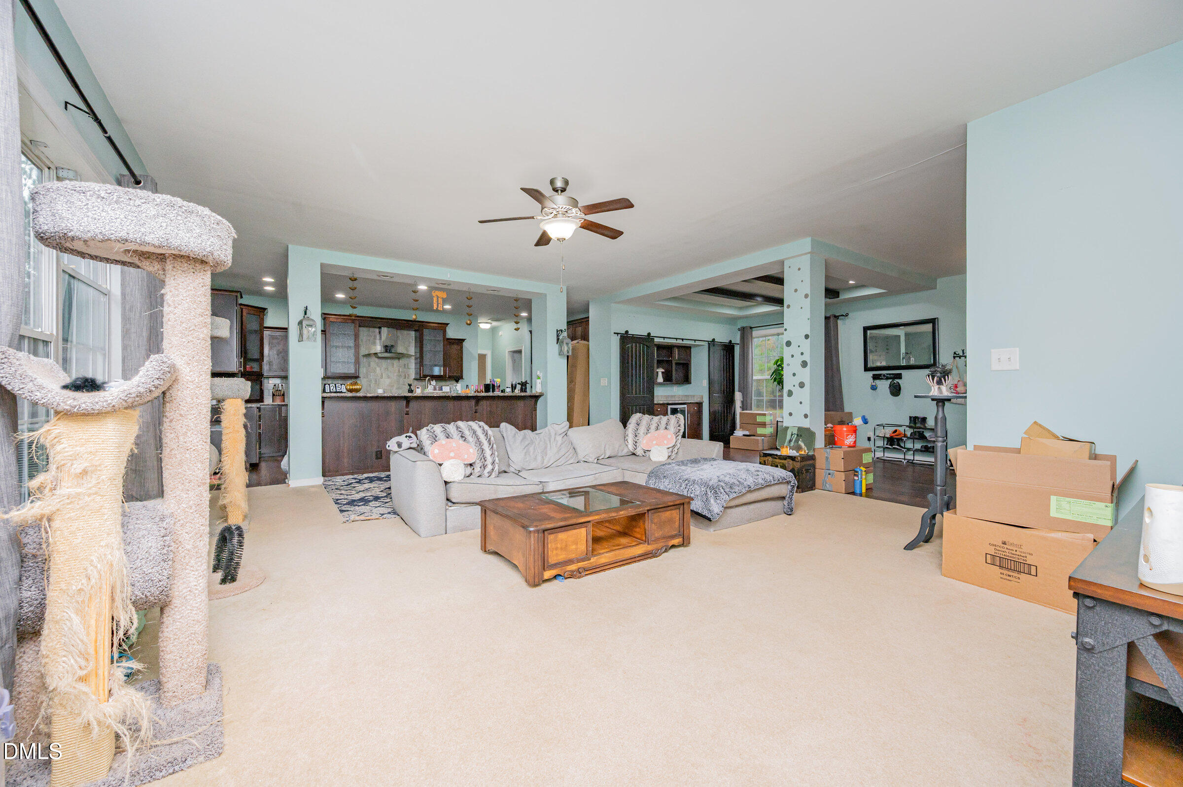 11801 Burlington Road Hurdle Mills, NC 27541 - Photo 8 of 32 a living room with furniture fireplace and a chandelier