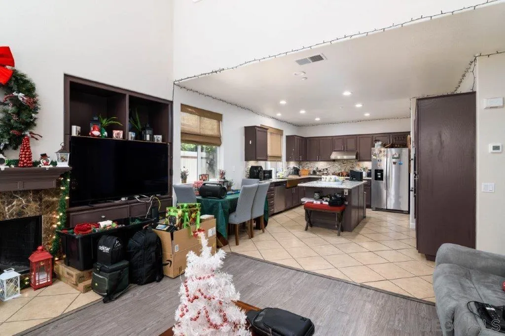 569 Inverlochy Drive Fallbrook, CA 92028 - Photo 11 of 46 a living room with lots of furniture and a flat screen tv