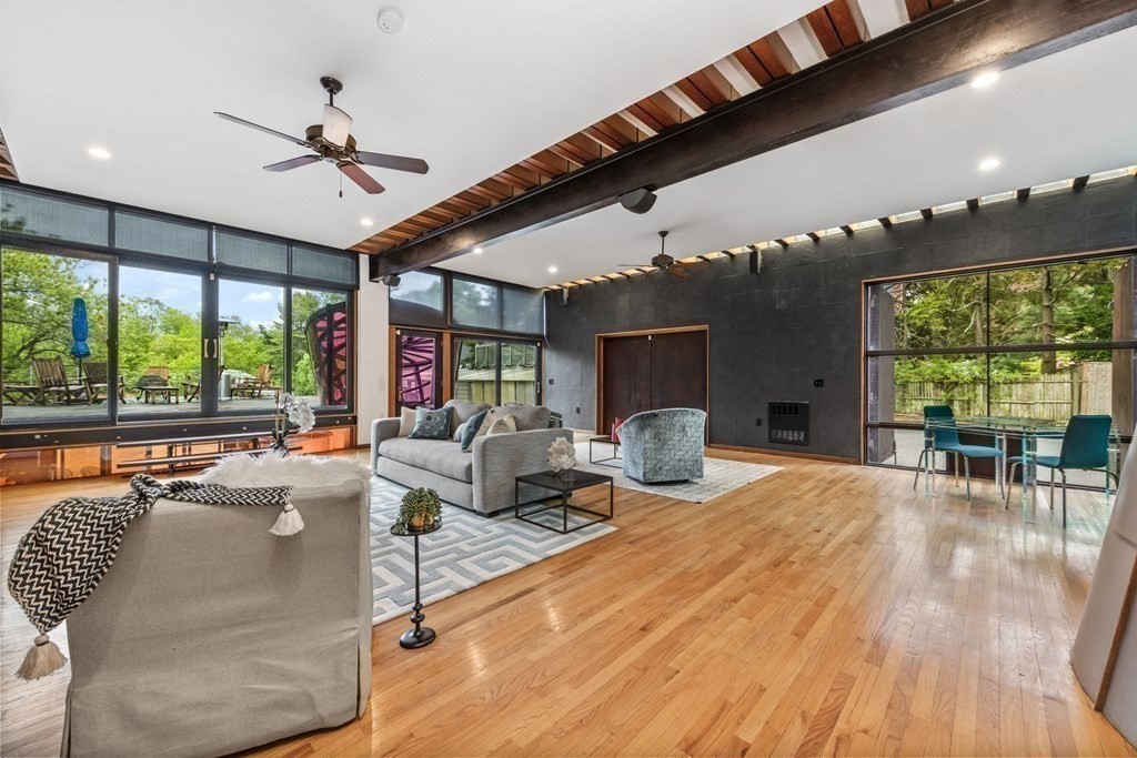 75 Kendall Road Lexington, MA 02421 - Photo 11 of 22 a living room with patio furniture and a large window