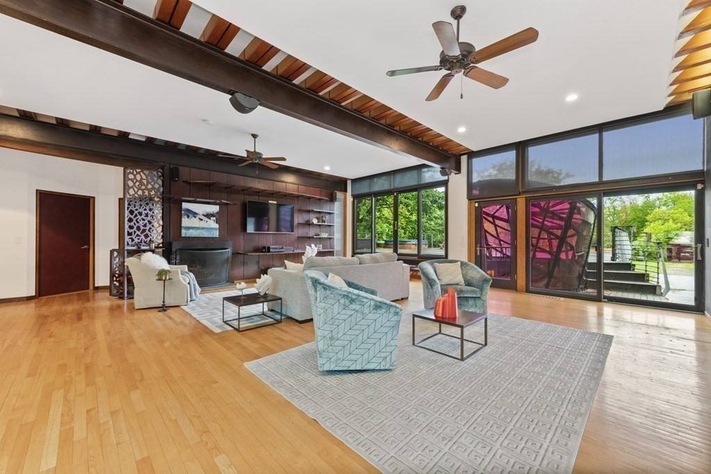75 Kendall Road Lexington, MA 02421 - Photo 13 of 22 a living room with furniture a window and a flat screen tv