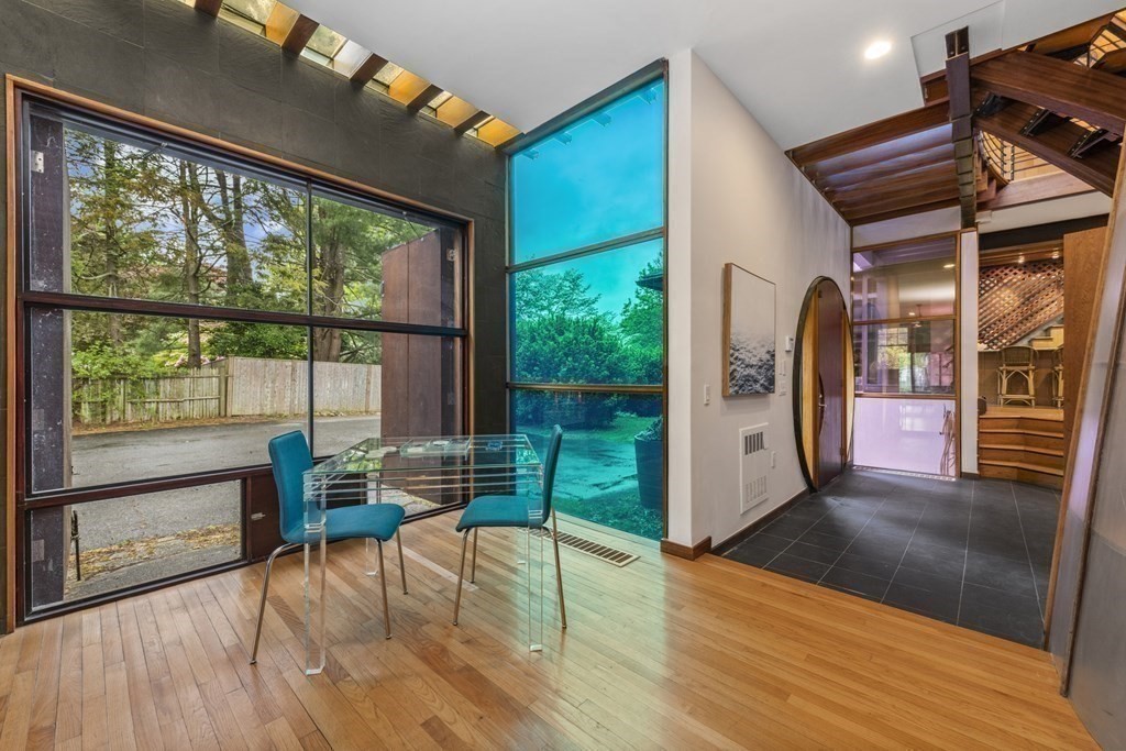 75 Kendall Road Lexington, MA 02421 - Photo 15 of 22 a view of a livingroom with furniture wooden floor and windows