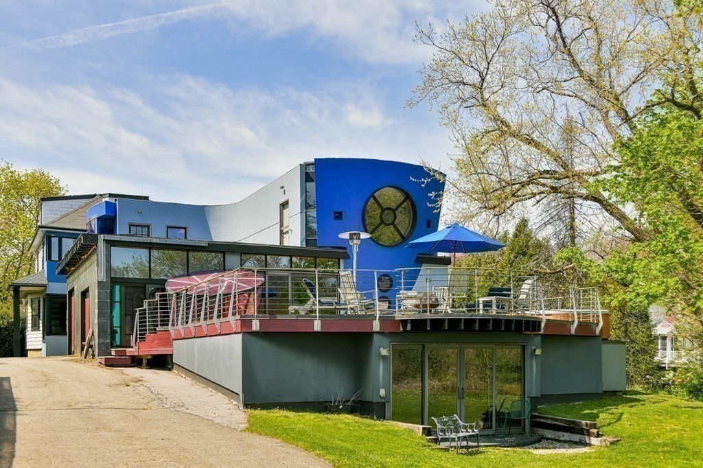 75 Kendall Road Lexington, MA 02421 - Photo 17 of 22 a view of a swimming pool with a patio