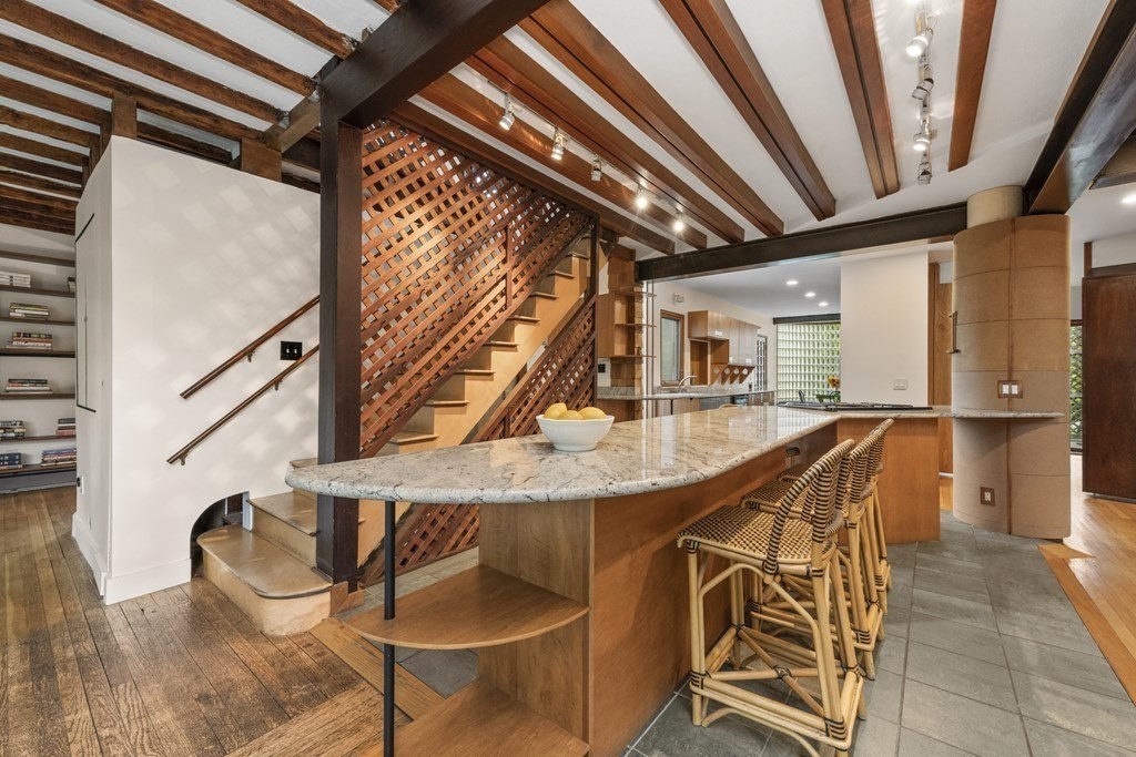 75 Kendall Road Lexington, MA 02421 - Photo 7 of 22 a dining room with furniture and a floor to ceiling window