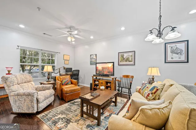 a living room with furniture a table and a window