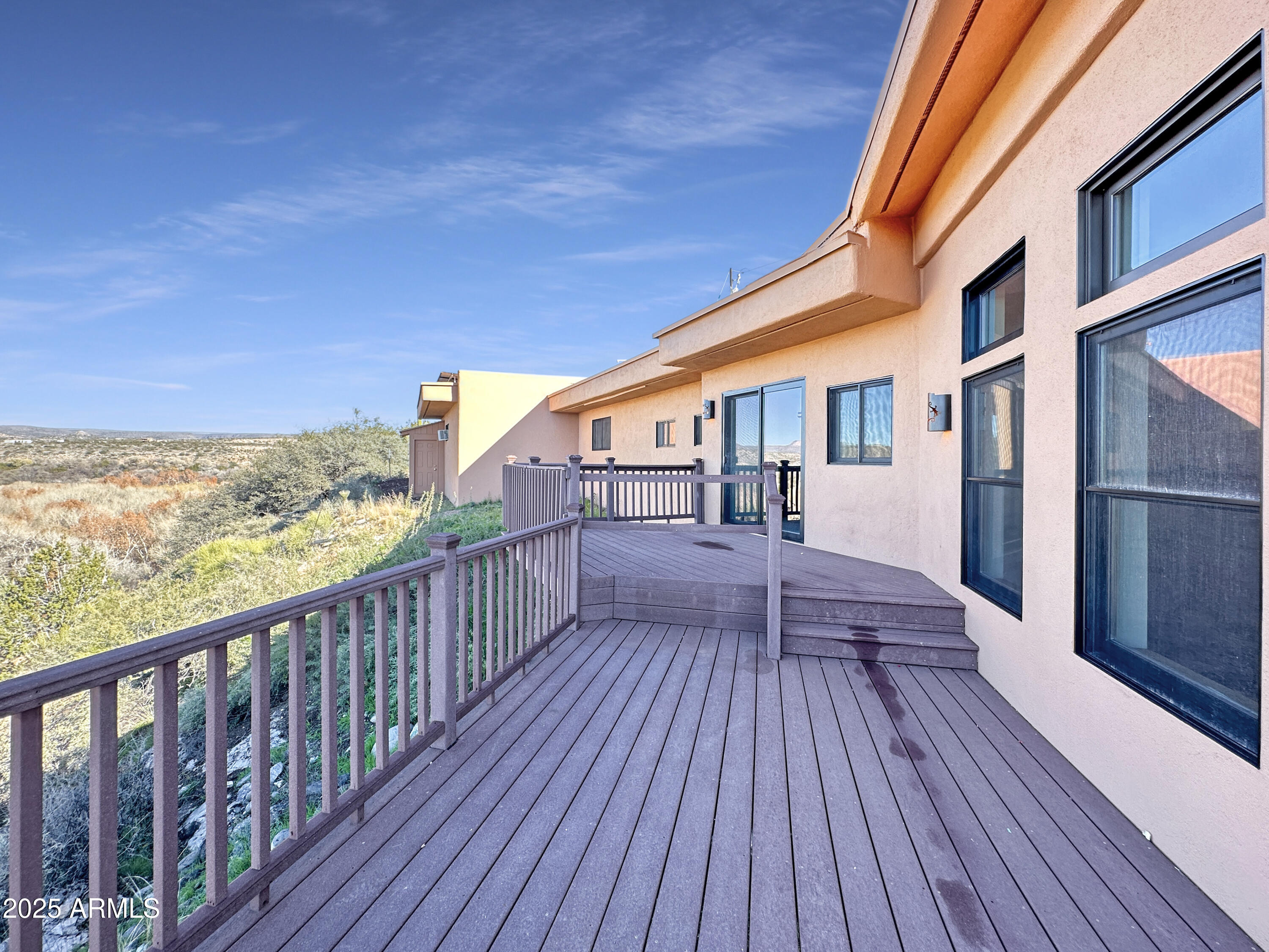 4580 Roundup Road Rimrock, AZ 86335 - Photo 15 of 21 a view of a balcony with wooden floor