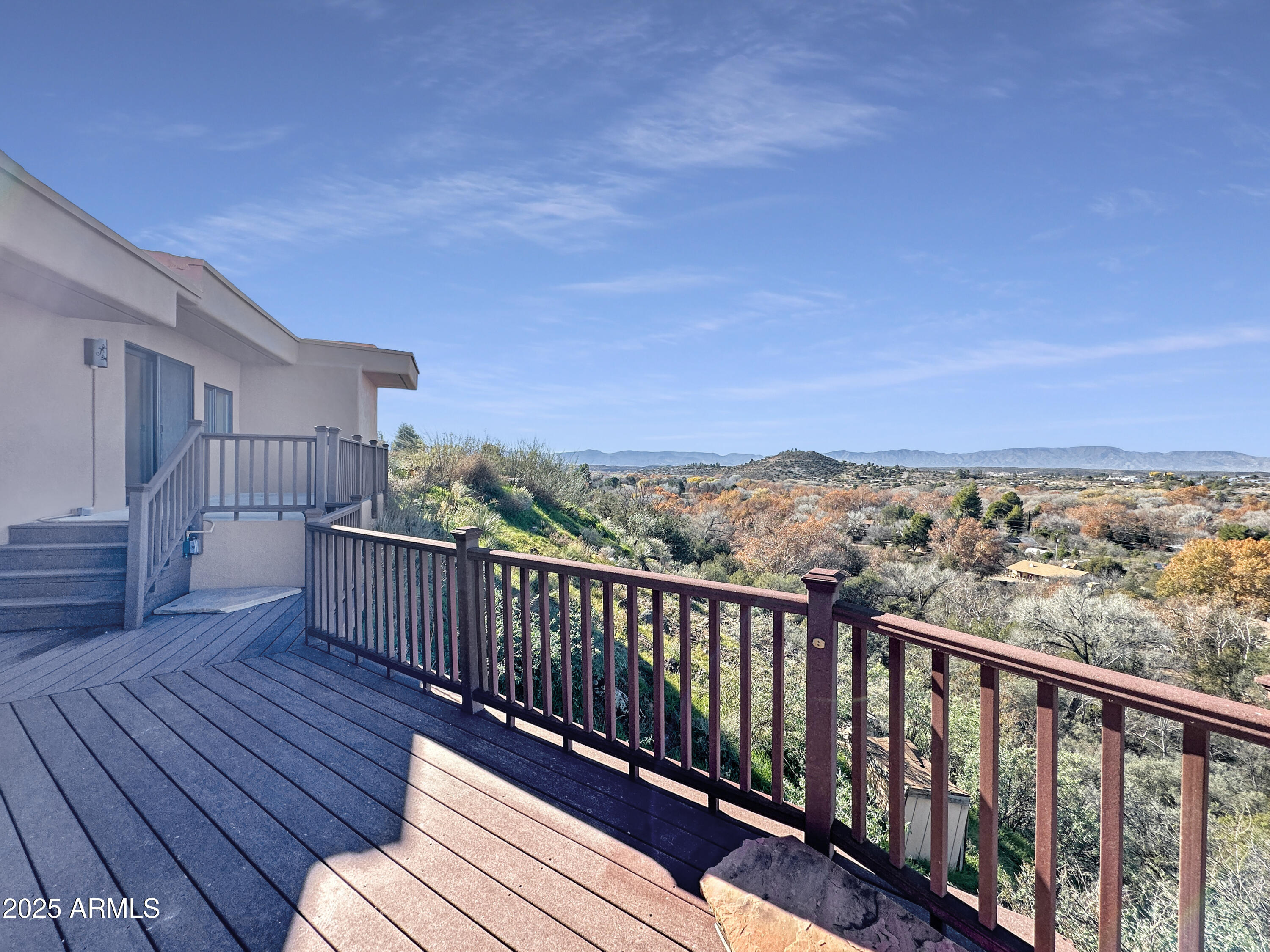 4580 Roundup Road Rimrock, AZ 86335 - Photo 16 of 21 a balcony with wooden floor and fence