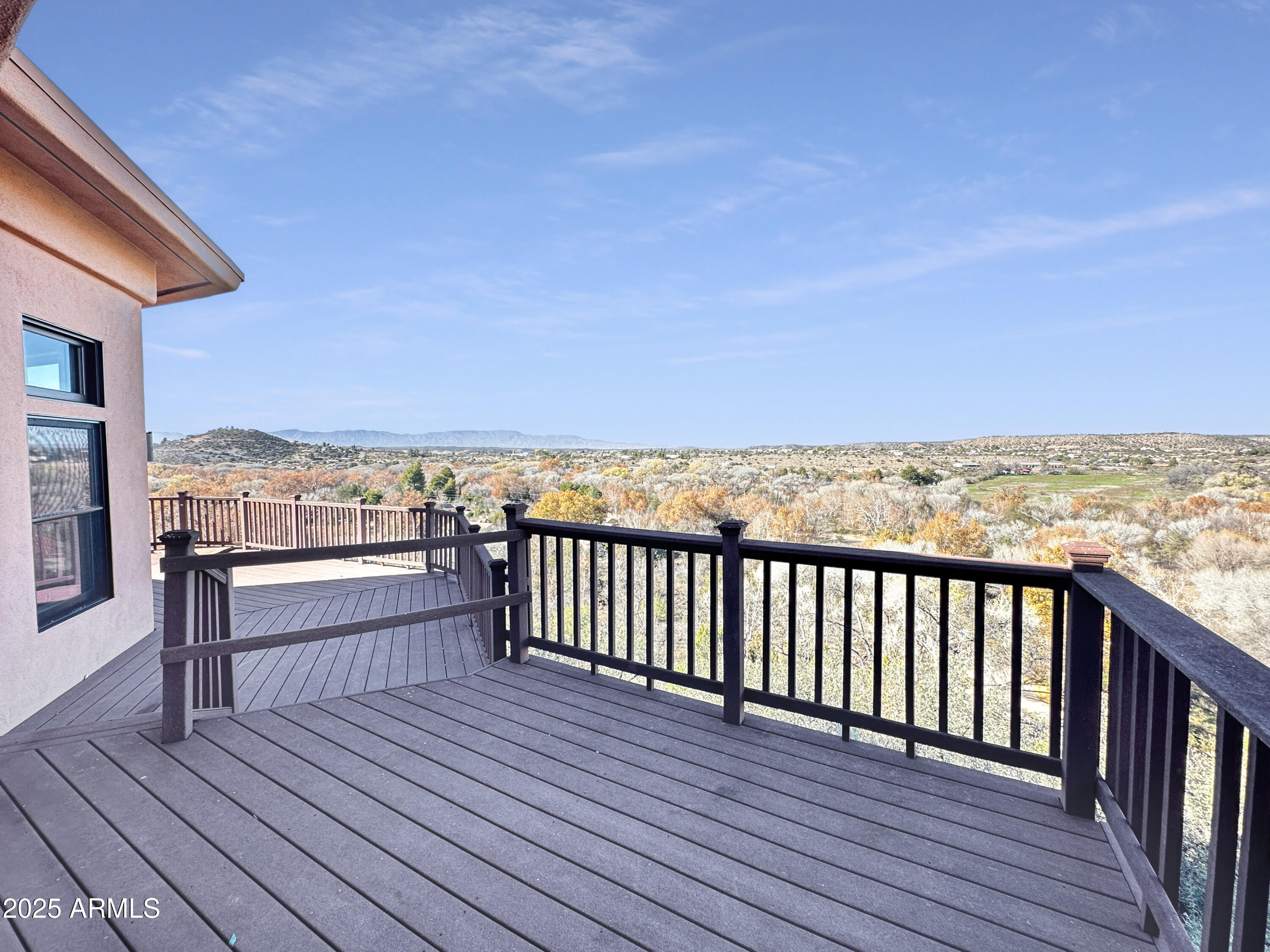 4580 Roundup Road Rimrock, AZ 86335 - Photo 17 of 21 a view of roof deck with wooden floor and seating space