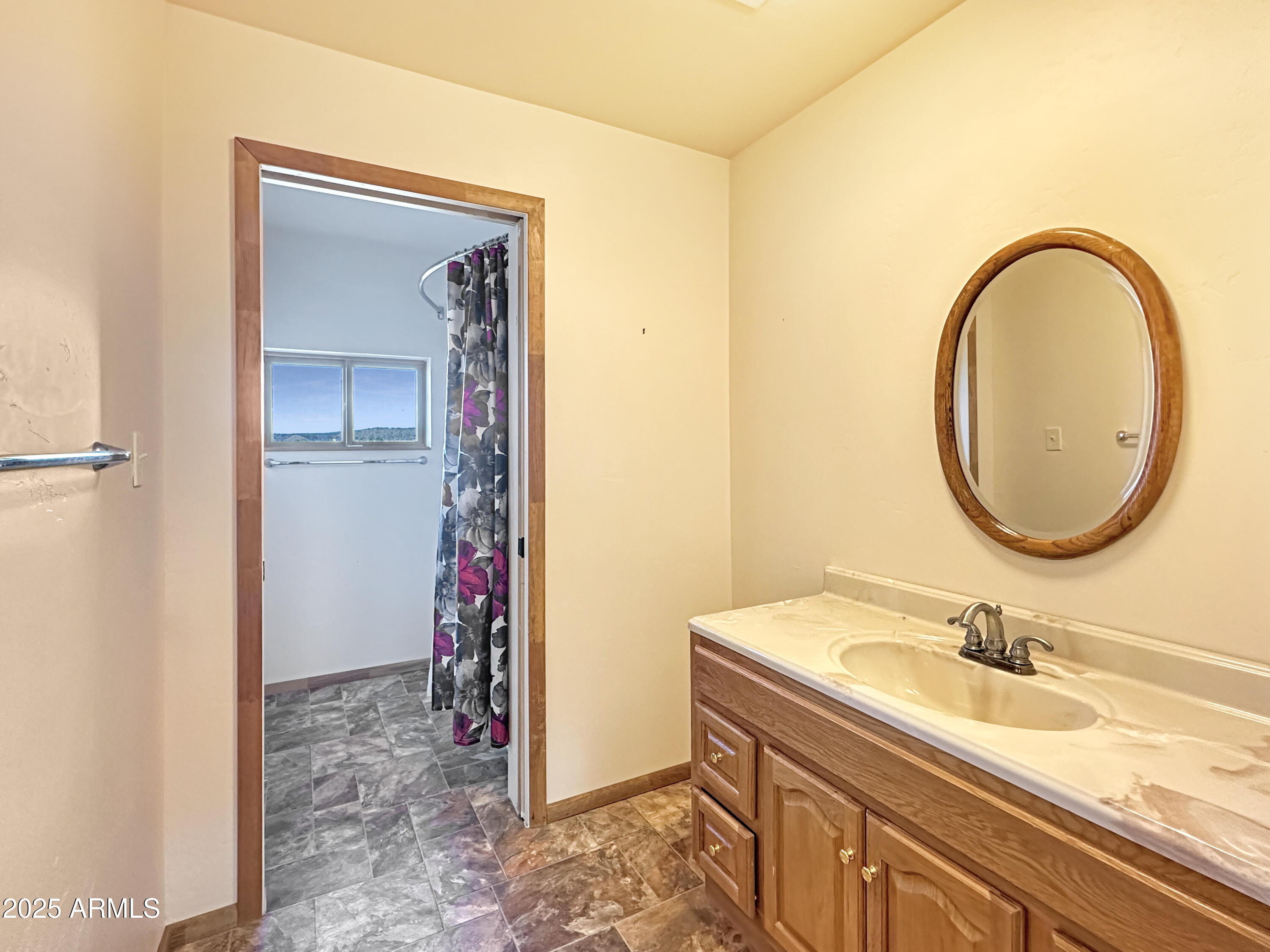 4580 Roundup Road Rimrock, AZ 86335 - Photo 19 of 21 a bathroom with a sink and a mirror