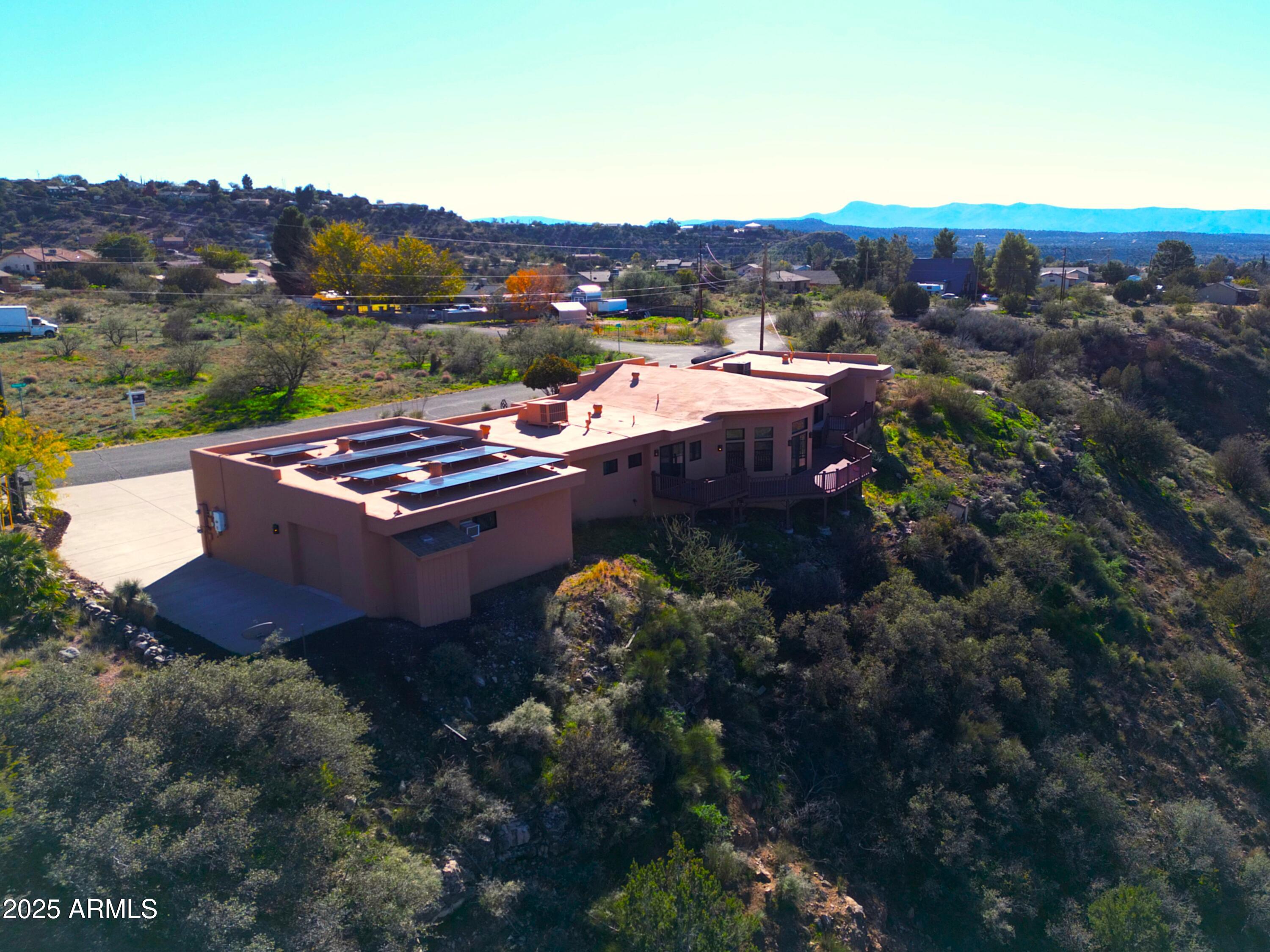 4580 Roundup Road Rimrock, AZ 86335 - Photo 4 of 21 a view of a terrace with a garden