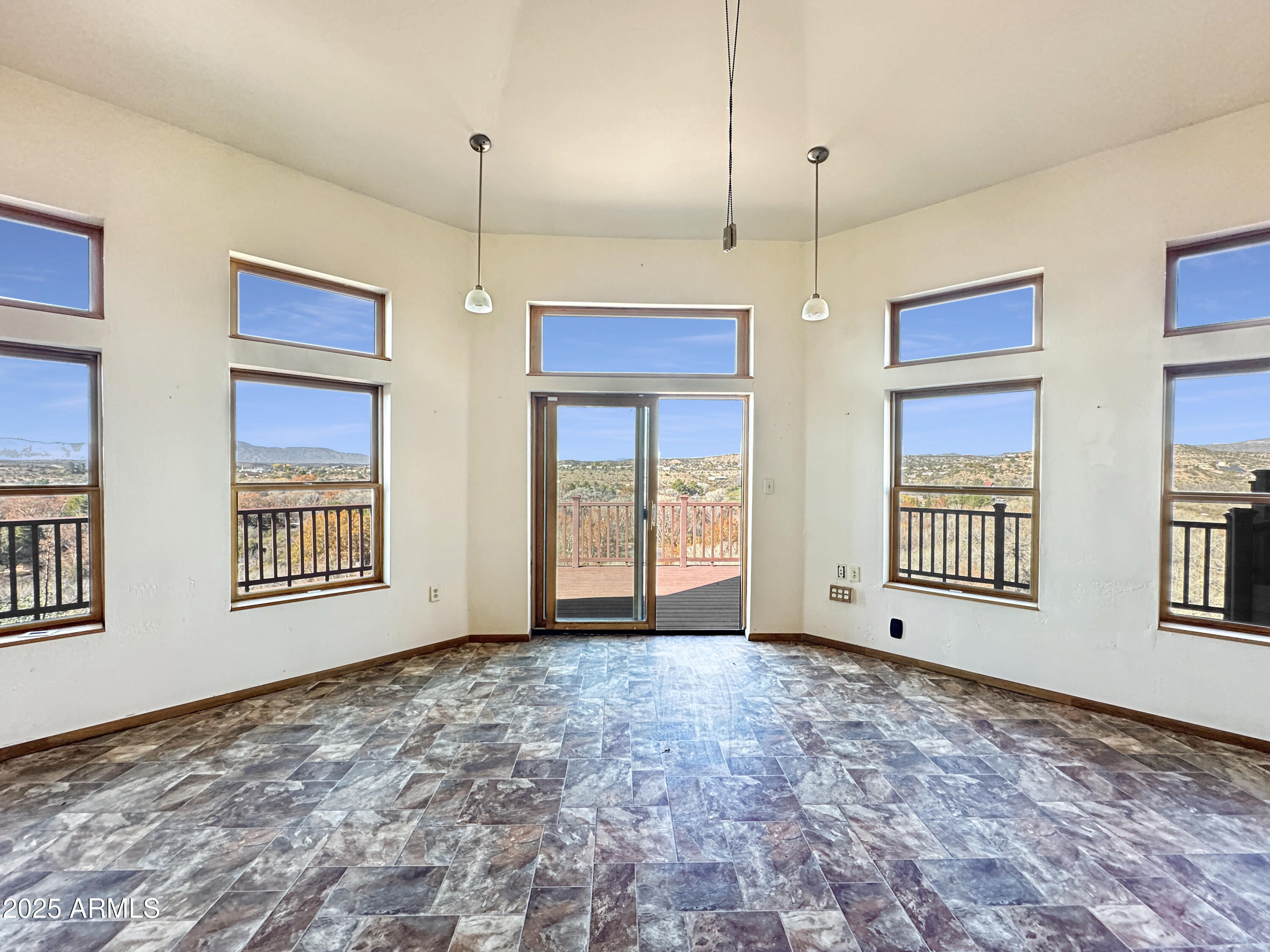 4580 Roundup Road Rimrock, AZ 86335 - Photo 8 of 21 a view of an empty room with windows