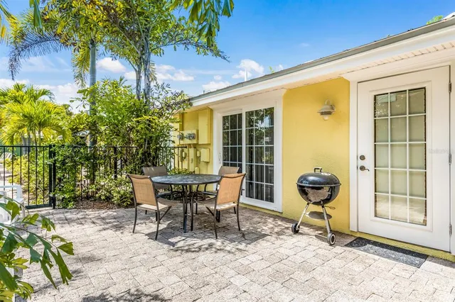 a outdoor seating area with furniture and garden