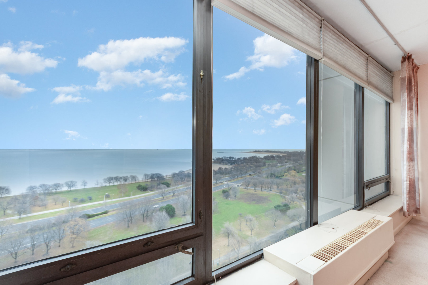 5445 North Sheridan Road, Unit 2306 Chicago, IL 60640 - Photo 4 of 25 a view of a glass door and a window