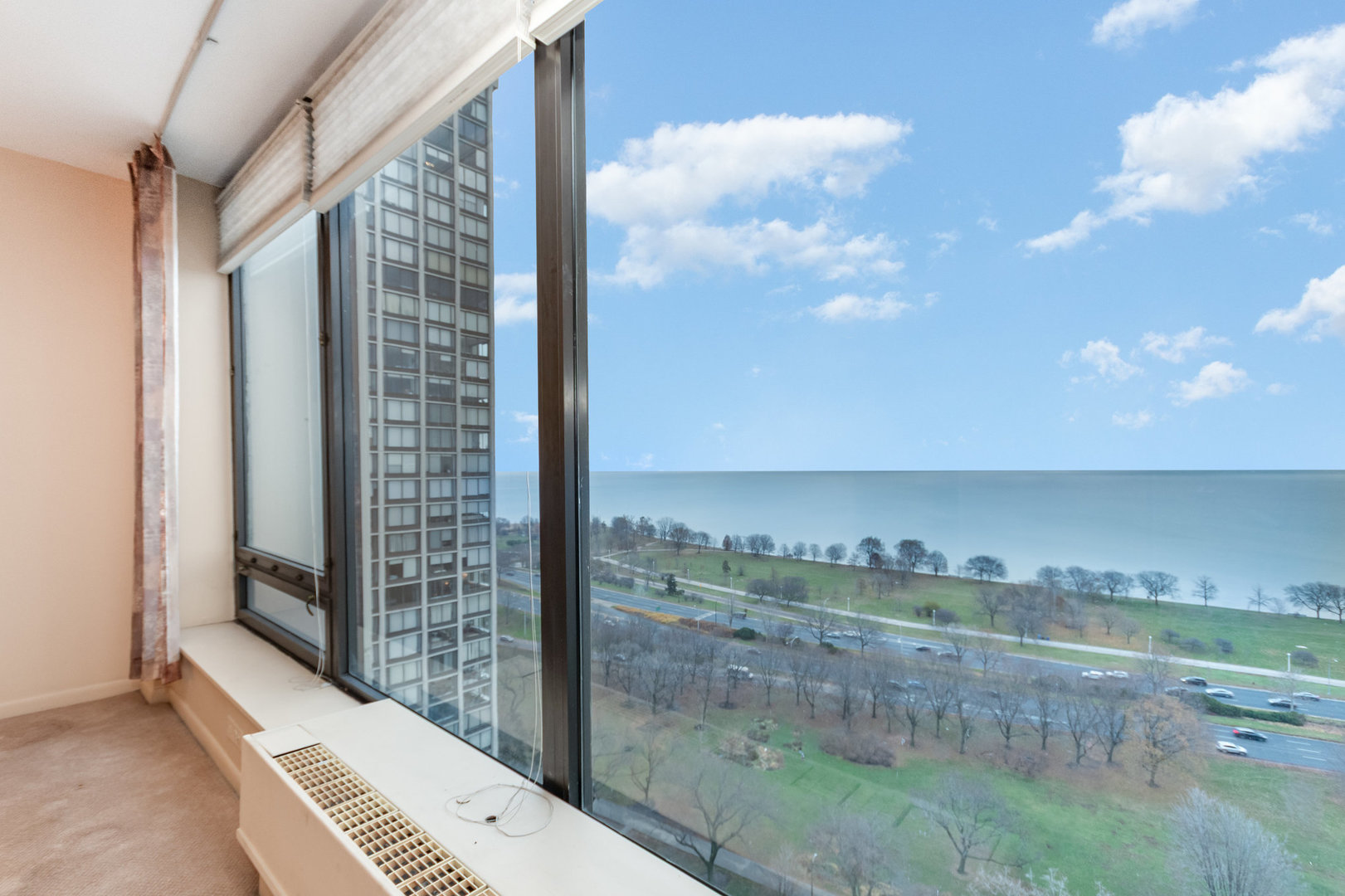 5445 North Sheridan Road, Unit 2306 Chicago, IL 60640 - Photo 5 of 25 a view of a balcony with an outdoor space