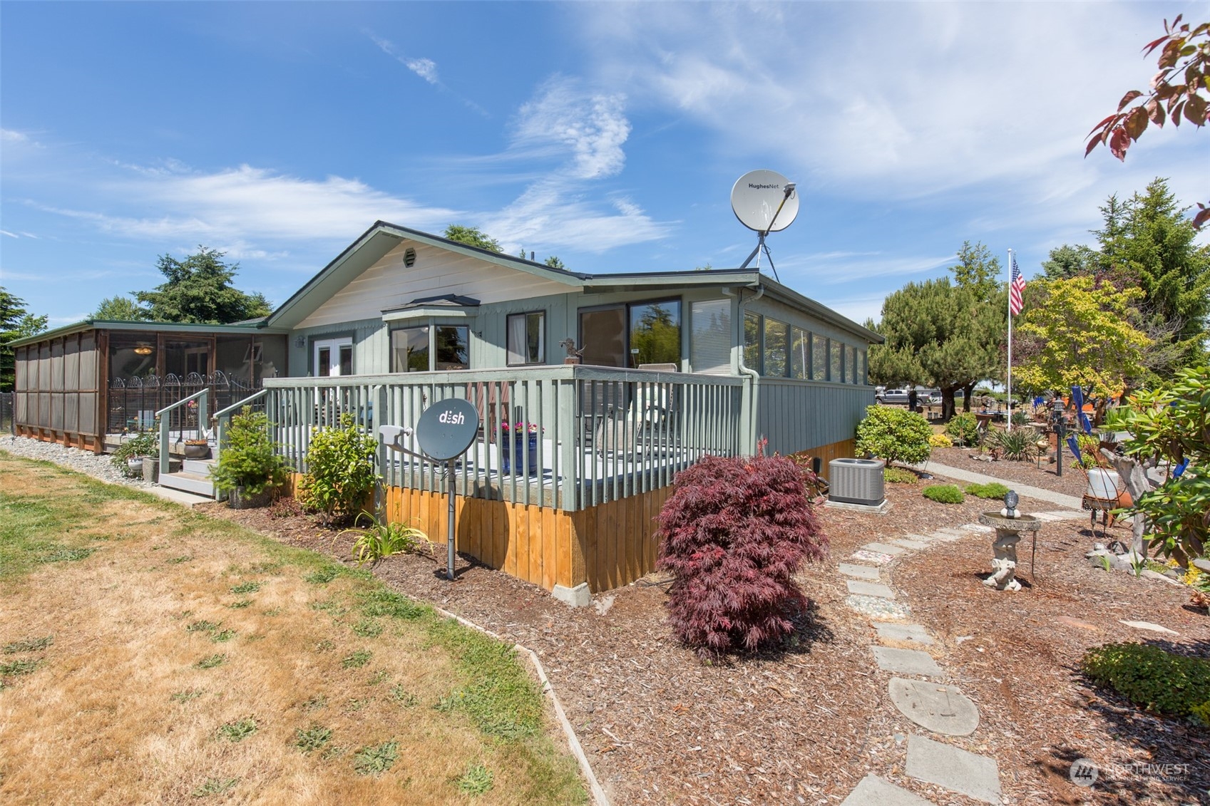 60 Klahhane Road Sequim, WA 98382 - Photo 20 of 36 a front view of a house with a yard