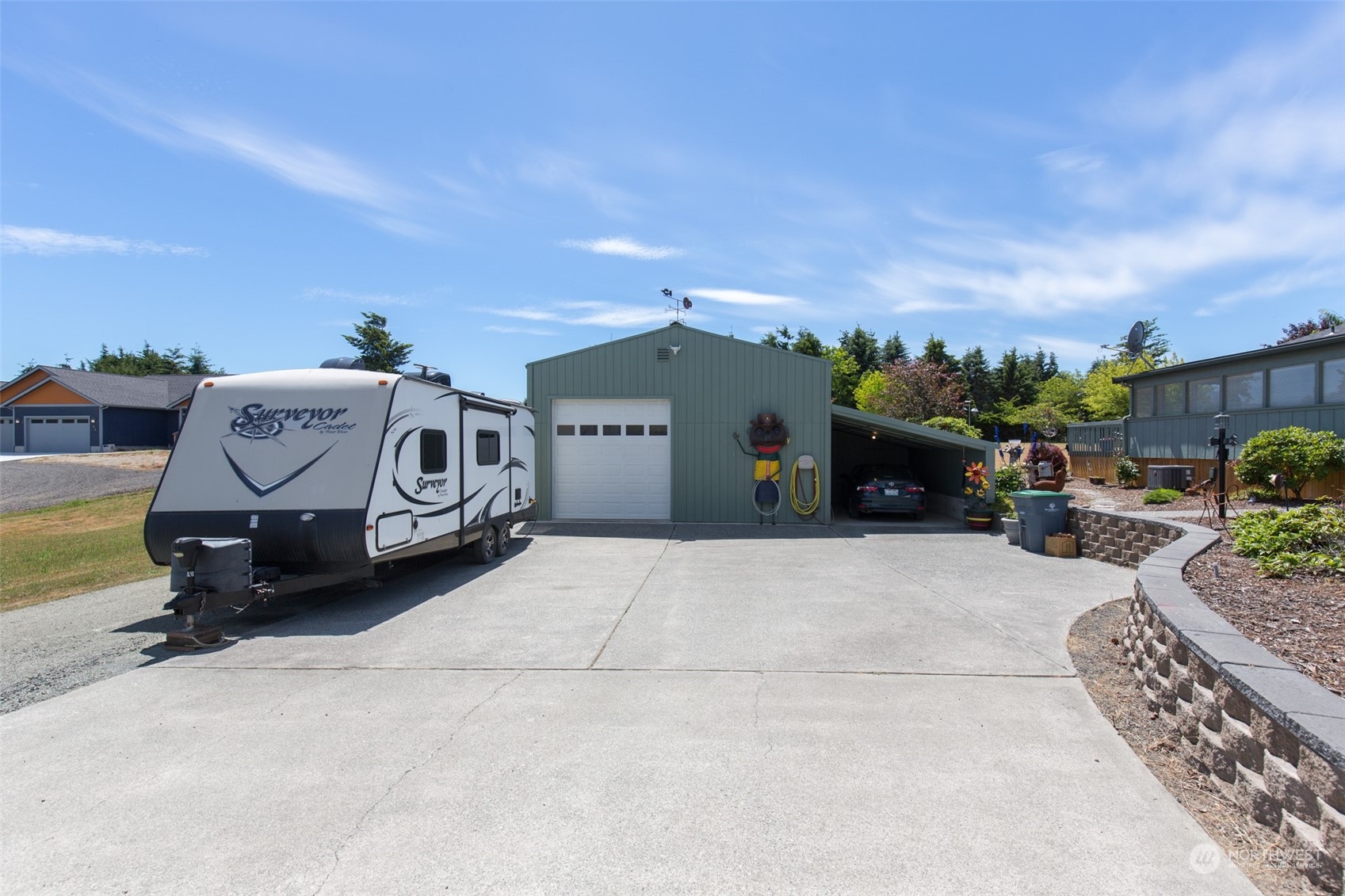 60 Klahhane Road Sequim, WA 98382 - Photo 28 of 36 a view of a car in front of house