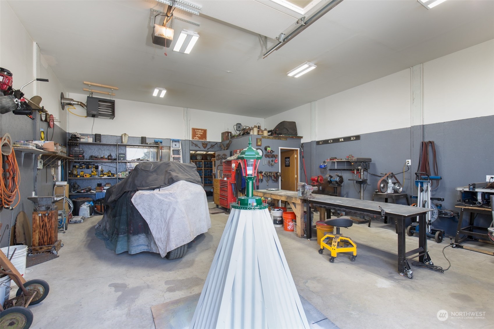 60 Klahhane Road Sequim, WA 98382 - Photo 30 of 36 a living room with furniture and a flat screen tv