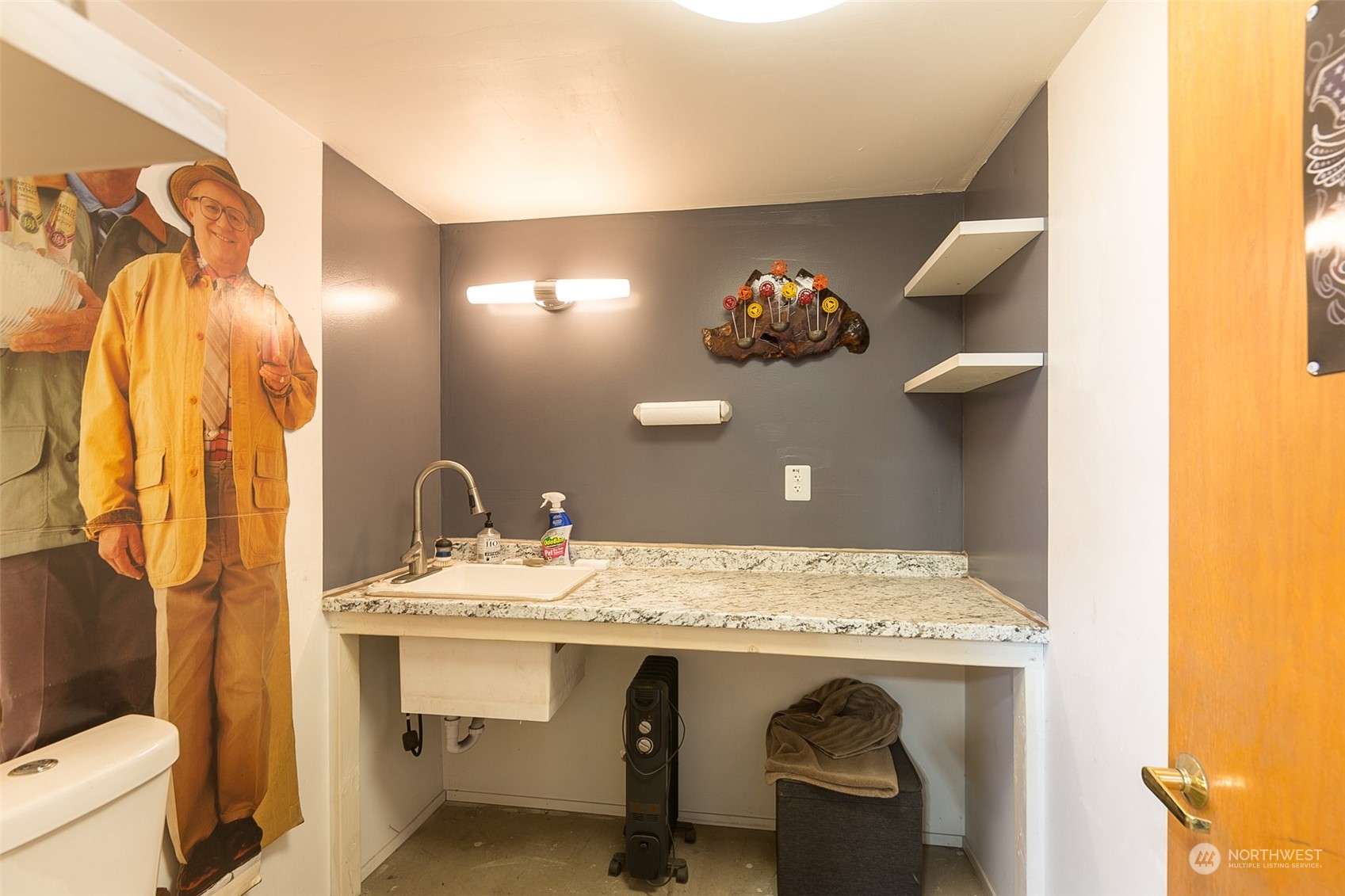 60 Klahhane Road Sequim, WA 98382 - Photo 31 of 36 a bathroom with a sink and a mirror
