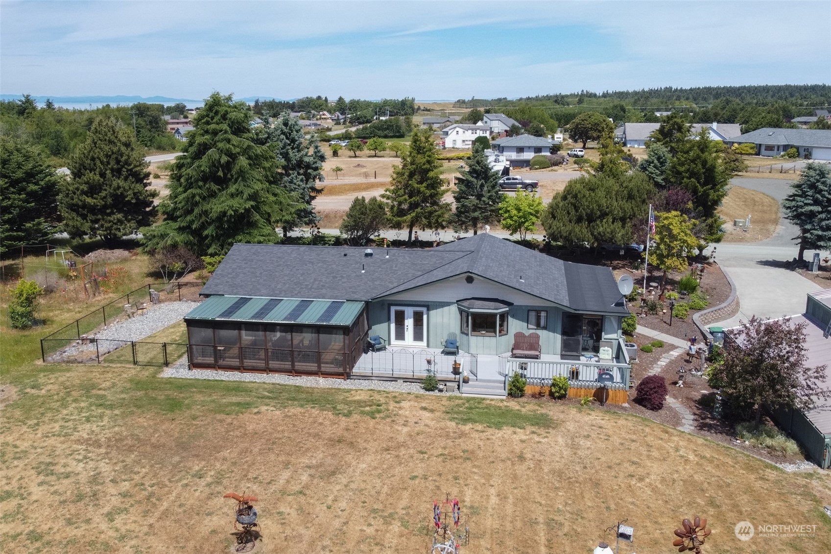 60 Klahhane Road Sequim, WA 98382 - Photo 33 of 36 an aerial view of a house with garden