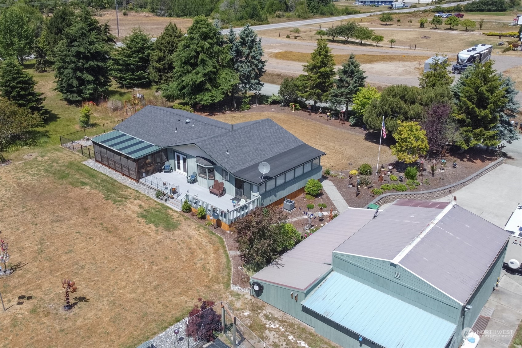 60 Klahhane Road Sequim, WA 98382 - Photo 34 of 36 an aerial view of a house with outdoor space and lake view