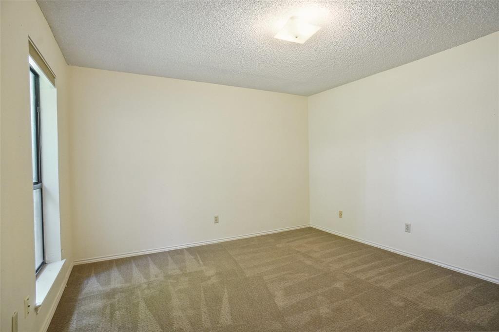 5717 Ridgerock Court Fort Worth, TX 76132 - Photo 15 of 20 an empty room with a empty space