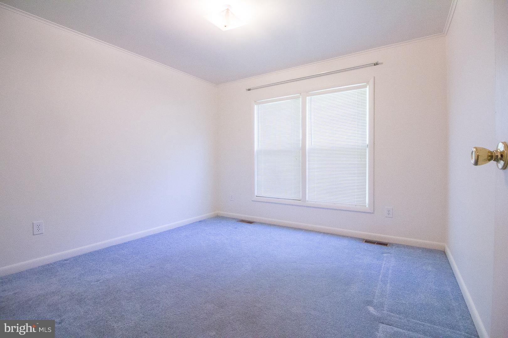 1208 Java Place Landover, MD 20785 - Photo 8 of 19 a view of an empty room with a window