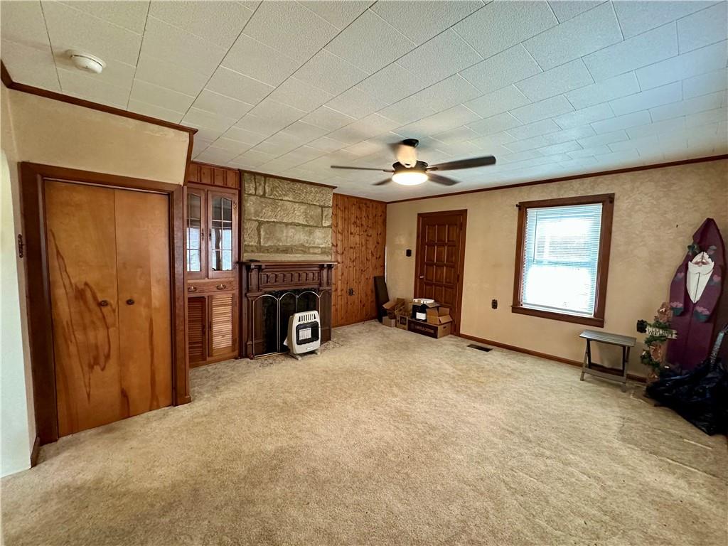 128 Buckland Road Wind Ridge, PA 15380 - Photo 9 of 34 a view of a livingroom with a fireplace and a workspace