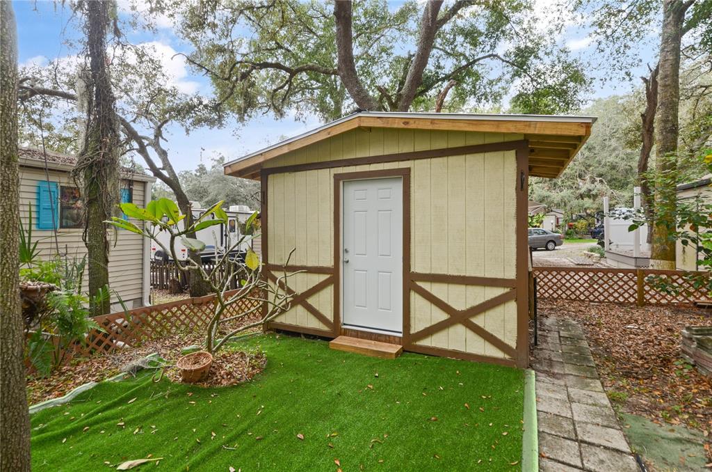3000 Clarcona Road, Unit 1218 Apopka, FL 32703 - Photo 11 of 22 a view of a house with a yard